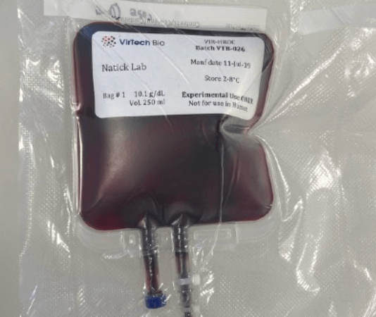 A filled blood bag of OxyBridge hemoglobin solution, labelled by the Natick lab